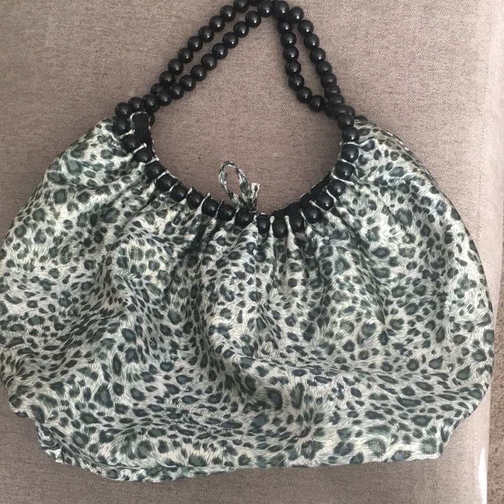 Green, gold, and black hobo bag